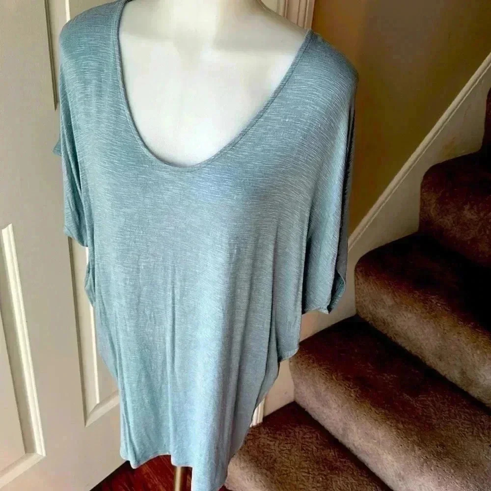 Size M light blue top by Laila Jayde